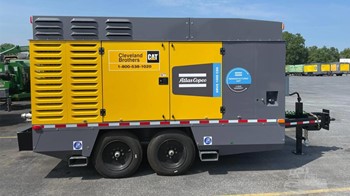 A 2024 Atlas Copco XRVS1000 CD6 Air Compressor in a lot.