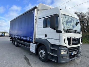 A 2018 MAN TGM 26.320 curtainsider truck.