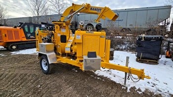 A 2024 Bandit 200XP towable wood chipper in a lot.