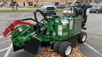 A 2024 Bandit 2550 stump grinder in a lot.